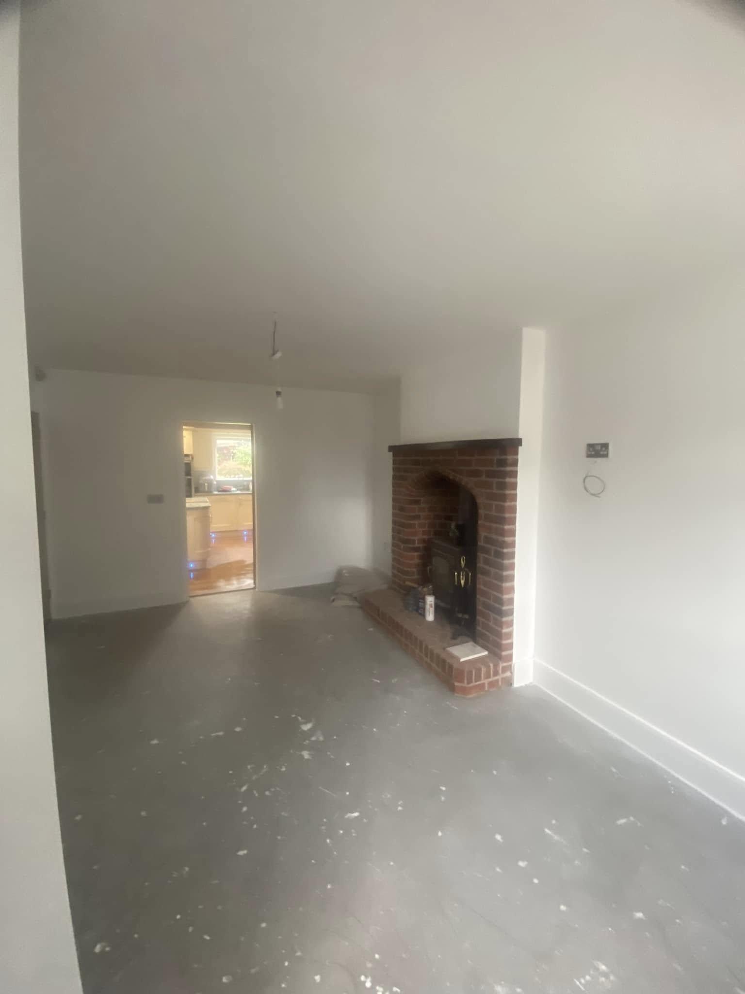 Living room with professional wallpaper finish